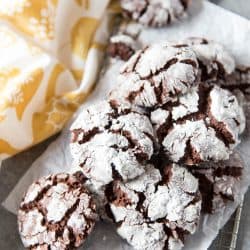 Chocolate crinkle cookies on a wire grate