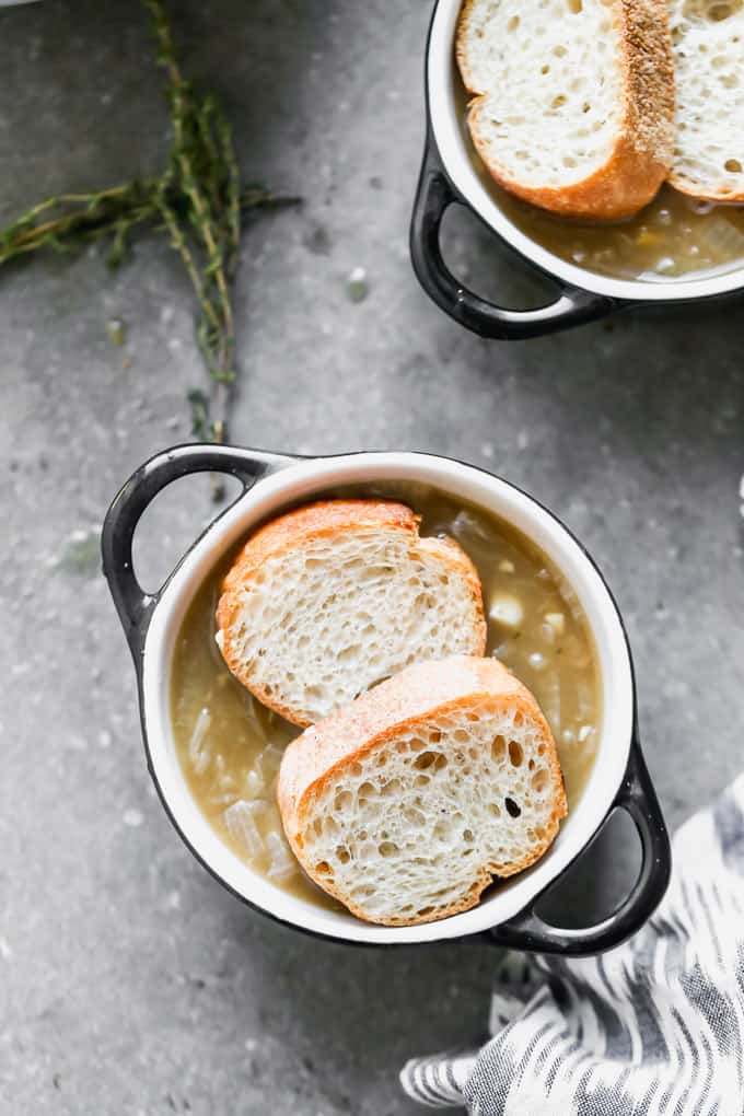 French onion soup with bread on top. 
