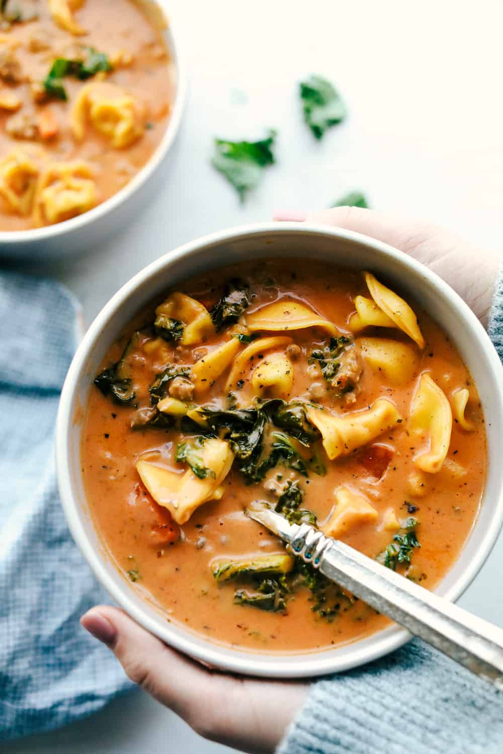 Creamy sausage tortellini soup in a bowl 
