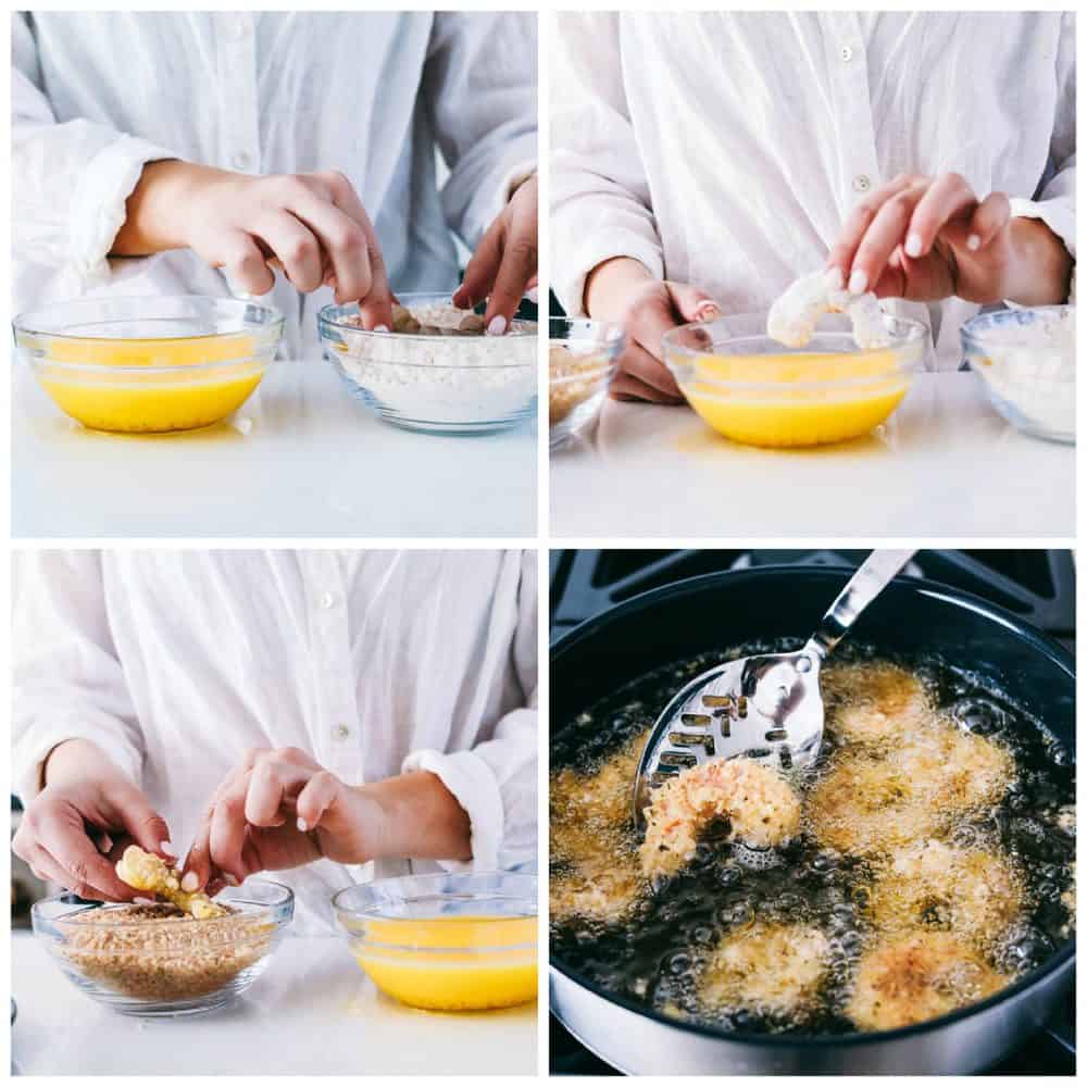 The process of making cajun popcorn shrimp. Dipping in egg, flour and seasonings. 