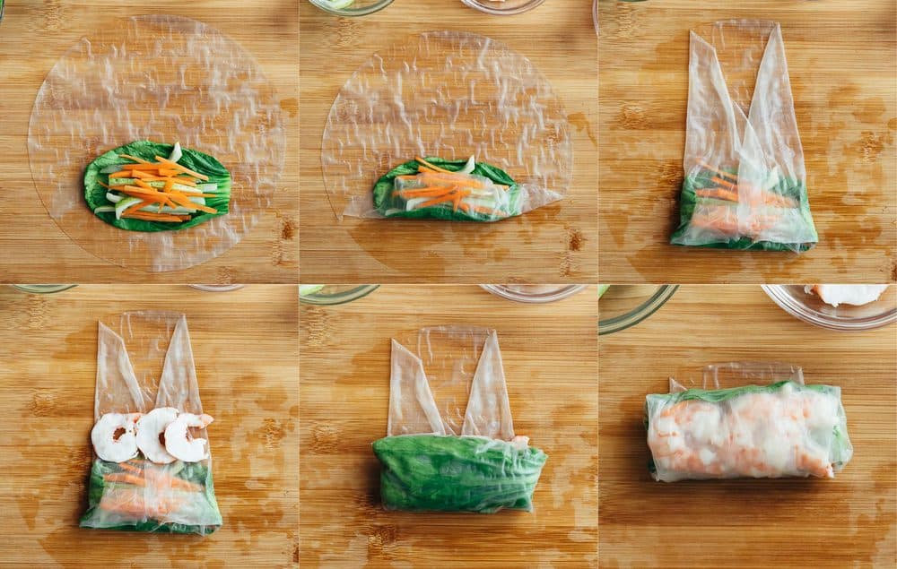 The process of wrapping up shrimp spring rolls.