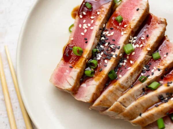 seared ahi tuna cut up and plated