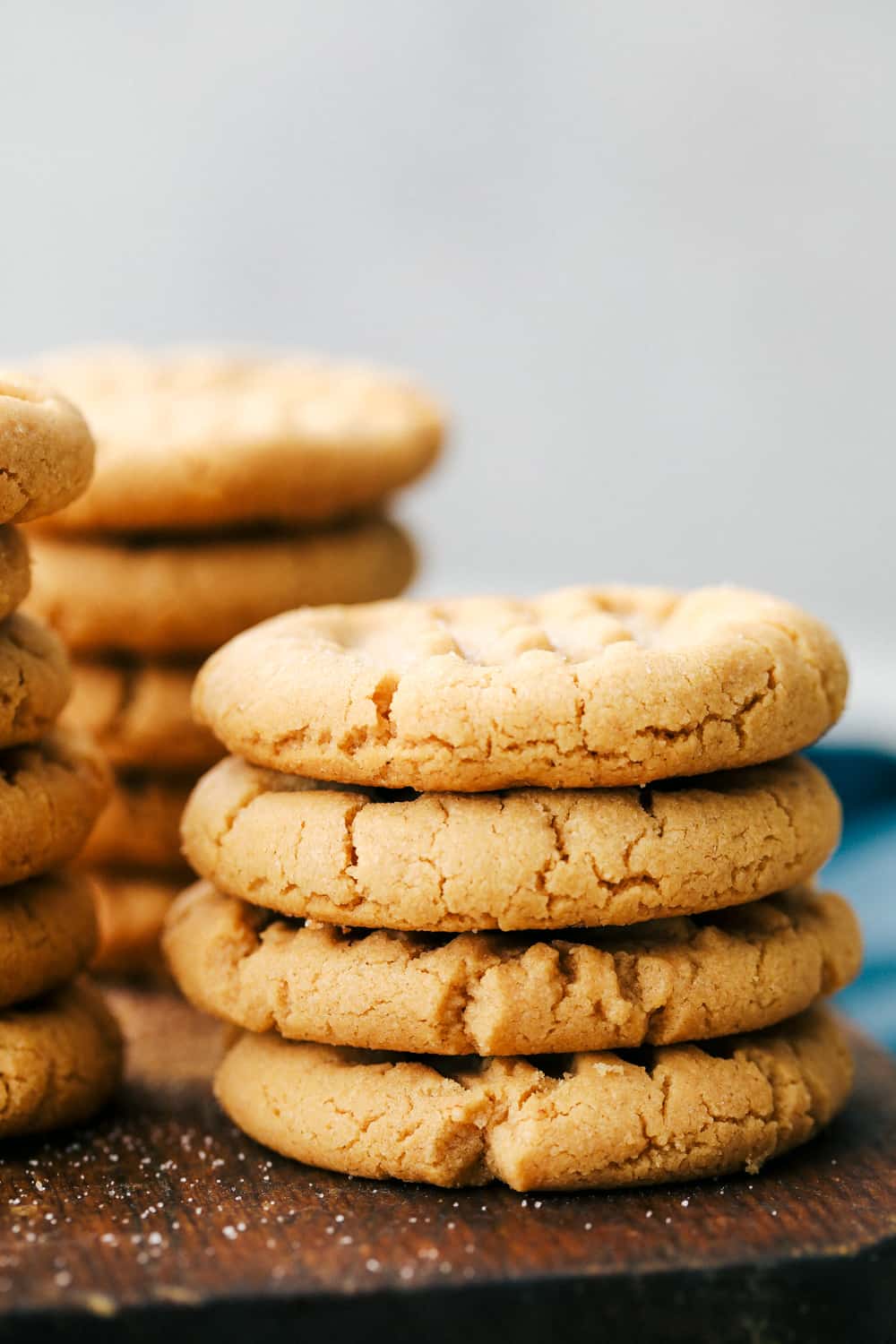 3 Ingredient peanut butter cookies stacked together on top of each other.