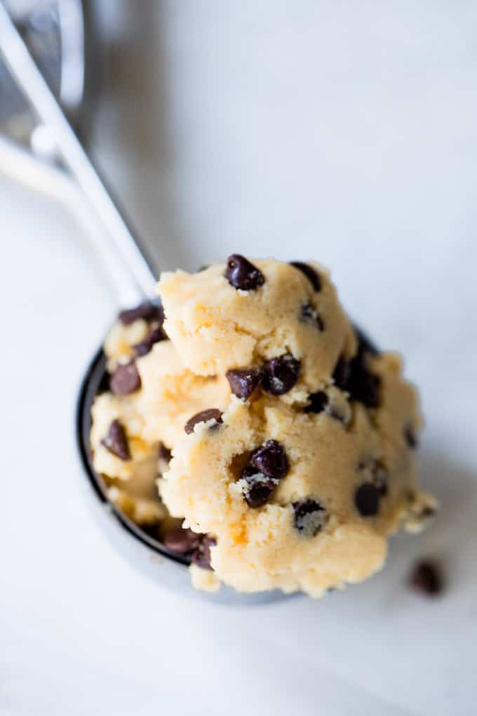 Edible cookie dough scooped in a 1 in cookie scooper. 