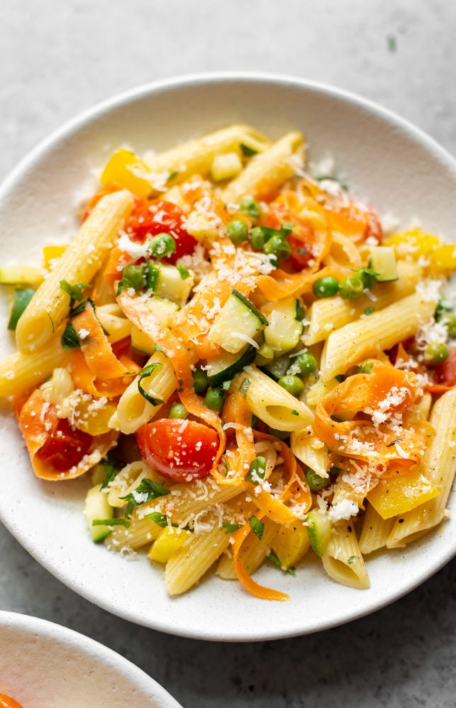 Pasta primavera in a white bowl