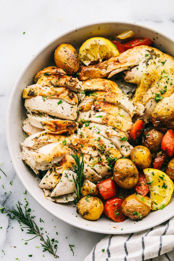 Garlic roasted chicken with vegetable in a bowl ready to serve. 