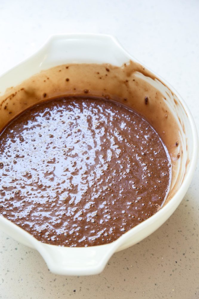Chocolate cake batter in a mixing bowl