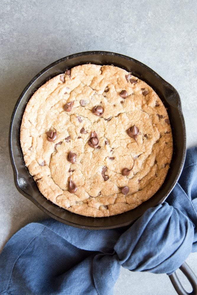 Baked pizookie in a cast iron skillet
