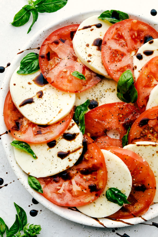Caprese Salad on a white plate.