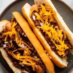 Closeup of chili dogs on a plate