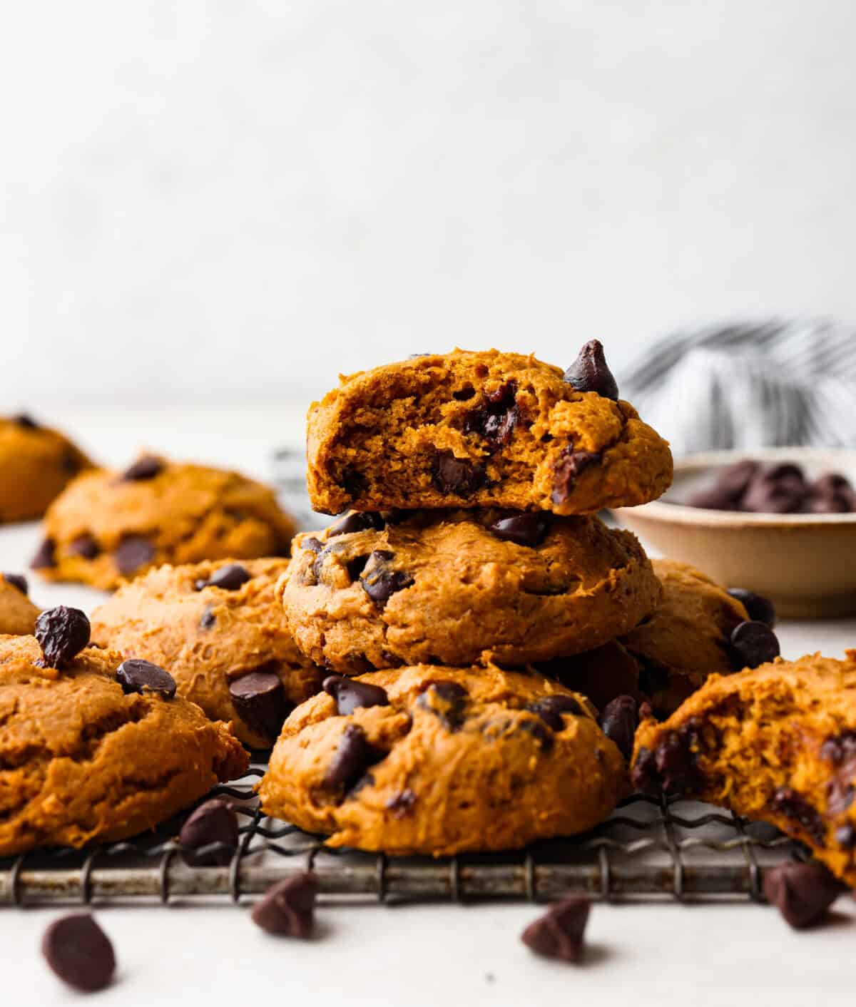 Side shot of a stack of 3 ingredient pumpkin chocolate chip cookies. 