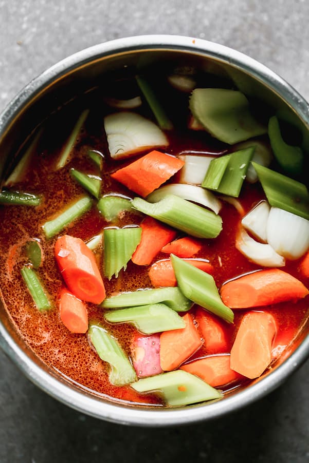 Cut vegetables in an instant pot.