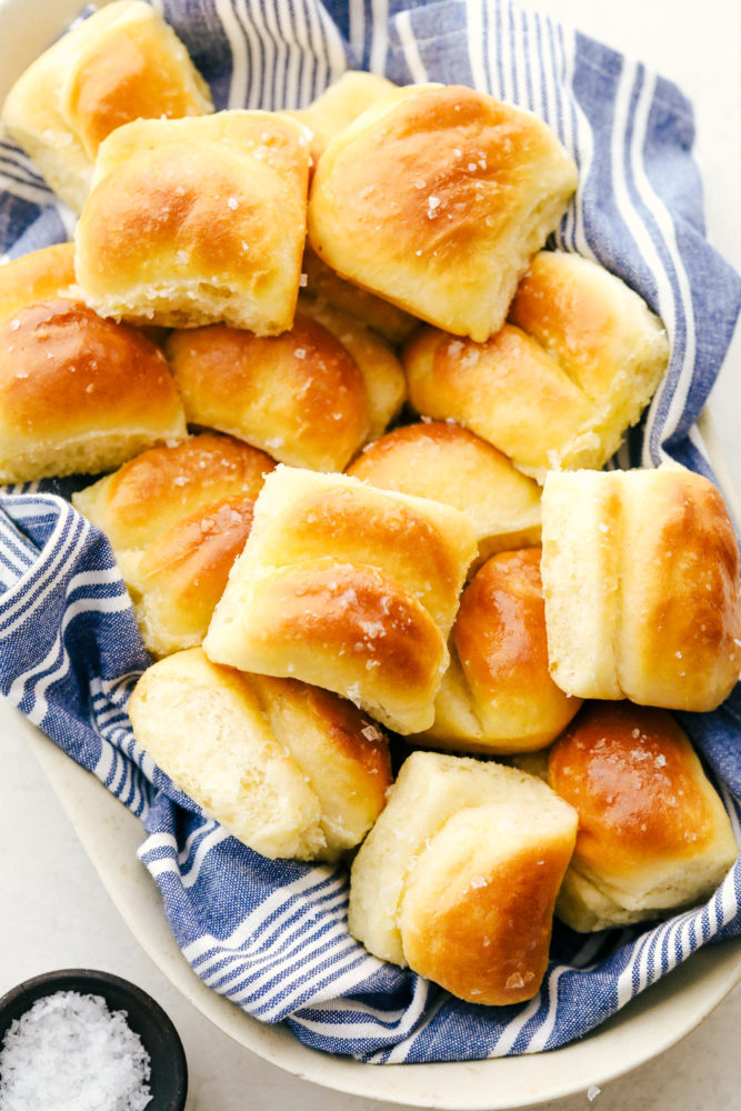 Parker House Rolls soft, melt in your mouth rolls, that are buttered before and after baking with flaky salt