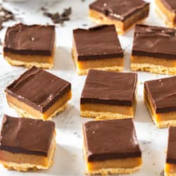Close up of a batch of sliced up millionaire shortbread