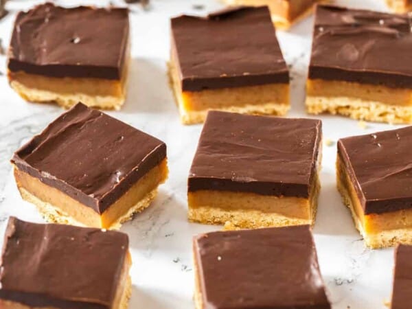 Close up of a batch of sliced up millionaire shortbread
