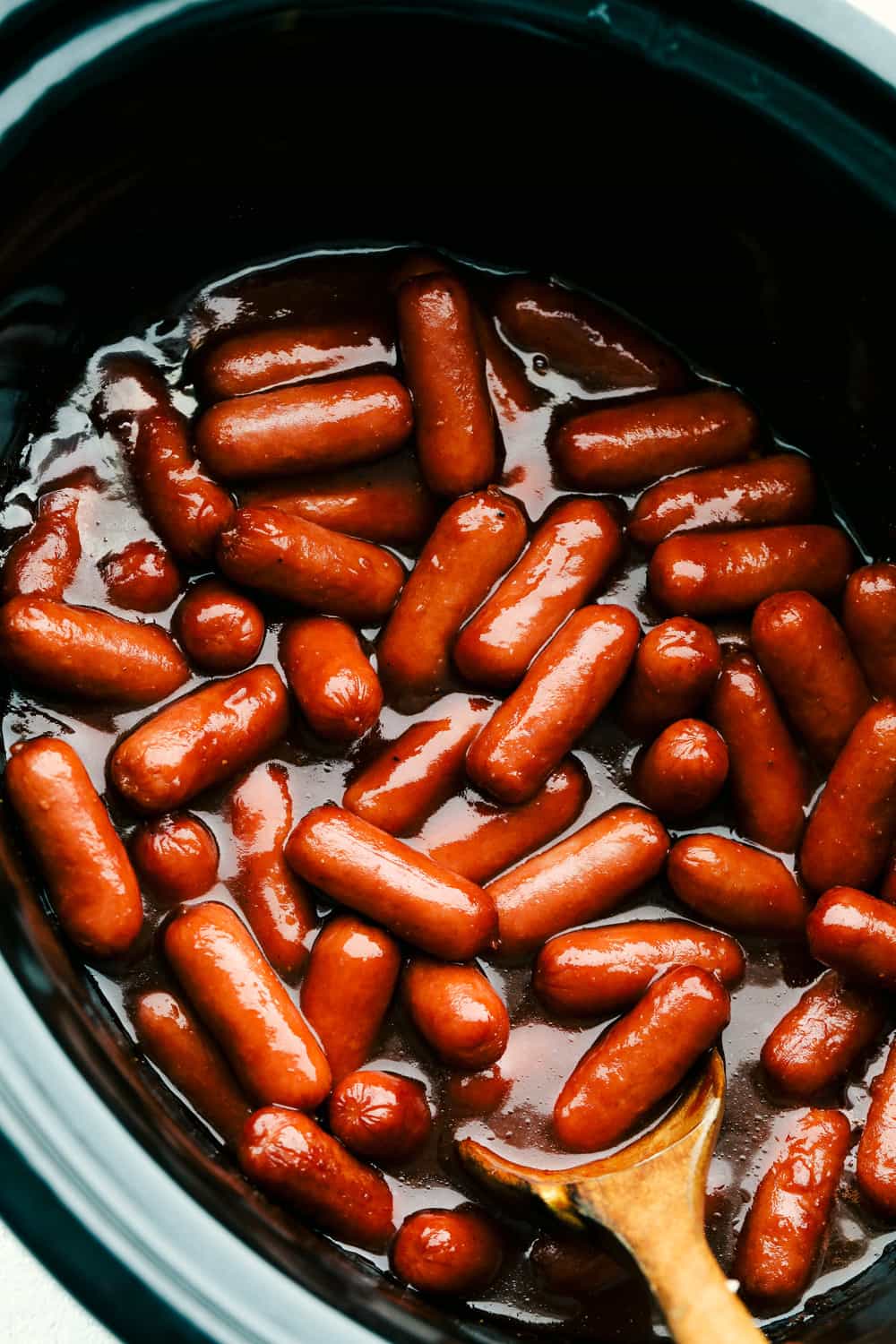 Savory, rich and flavorful BBQ Little Smokies in the slow cooker.