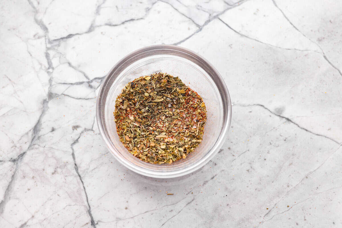 With this Air Fyer Chicken recipe, I am going to show you how to make the most insanely tender and juicy chicken! The secret? The incredible seasonings! They create a nice golden, crispy outside with a juicy, flavor-packed inside! Seasoning blend mixed together in a small mixing bowl.