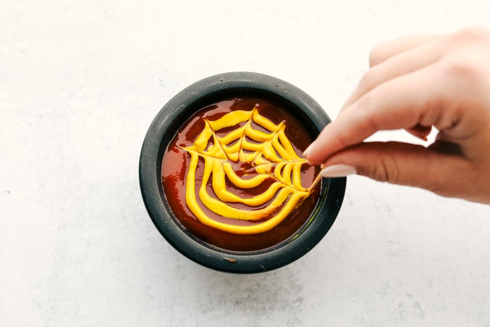 Making Spider Web dipping sauce.