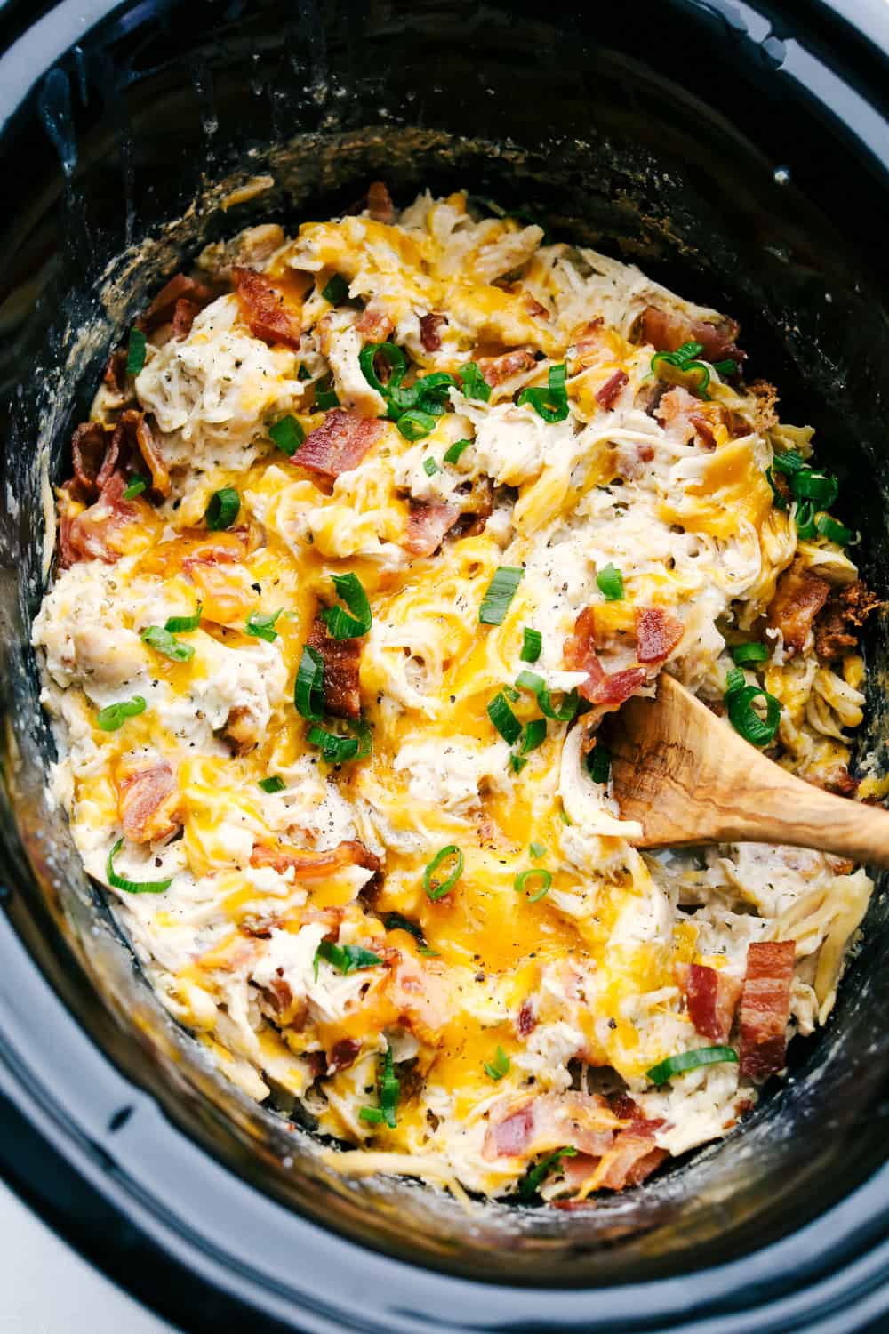 Creamy, rich addicting Slow Cooker Crack Chicken with cheddar, bacon and ranch