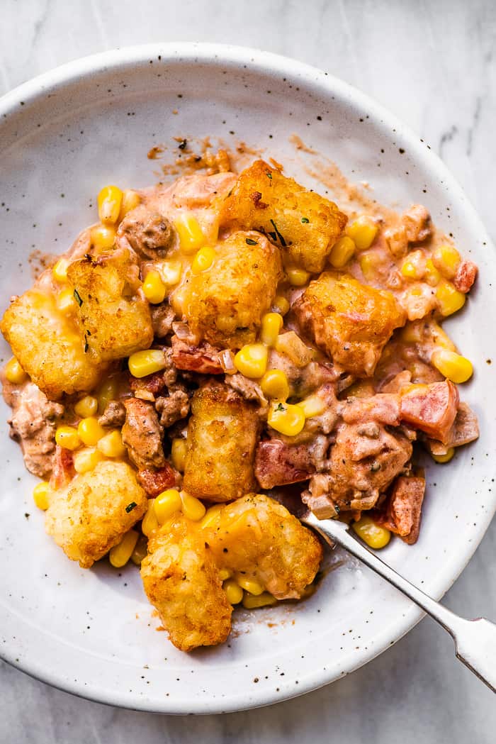 A white bowl filled with cowboy casserole 