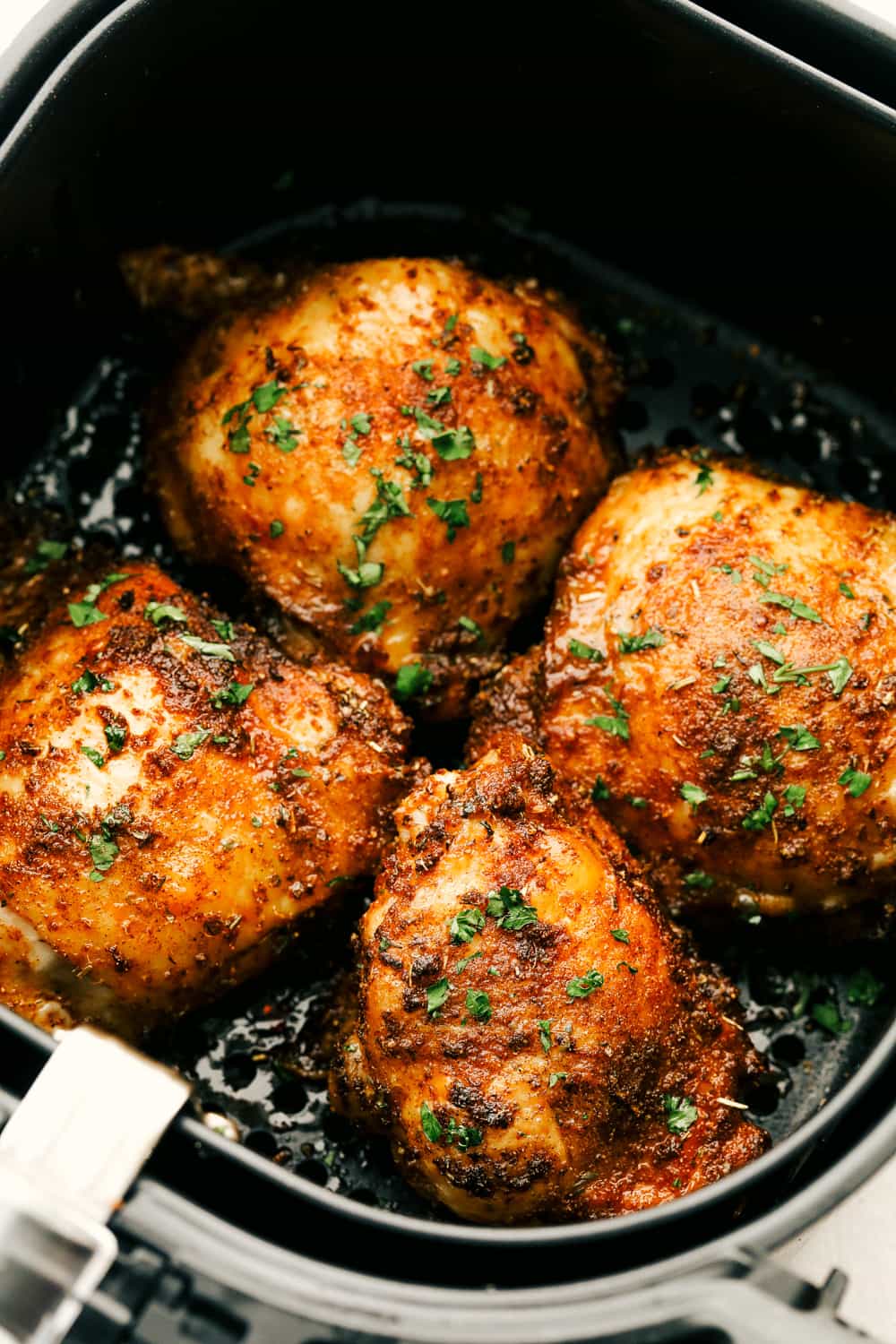 Air fryer chicken thighs perfectly seasoned. 