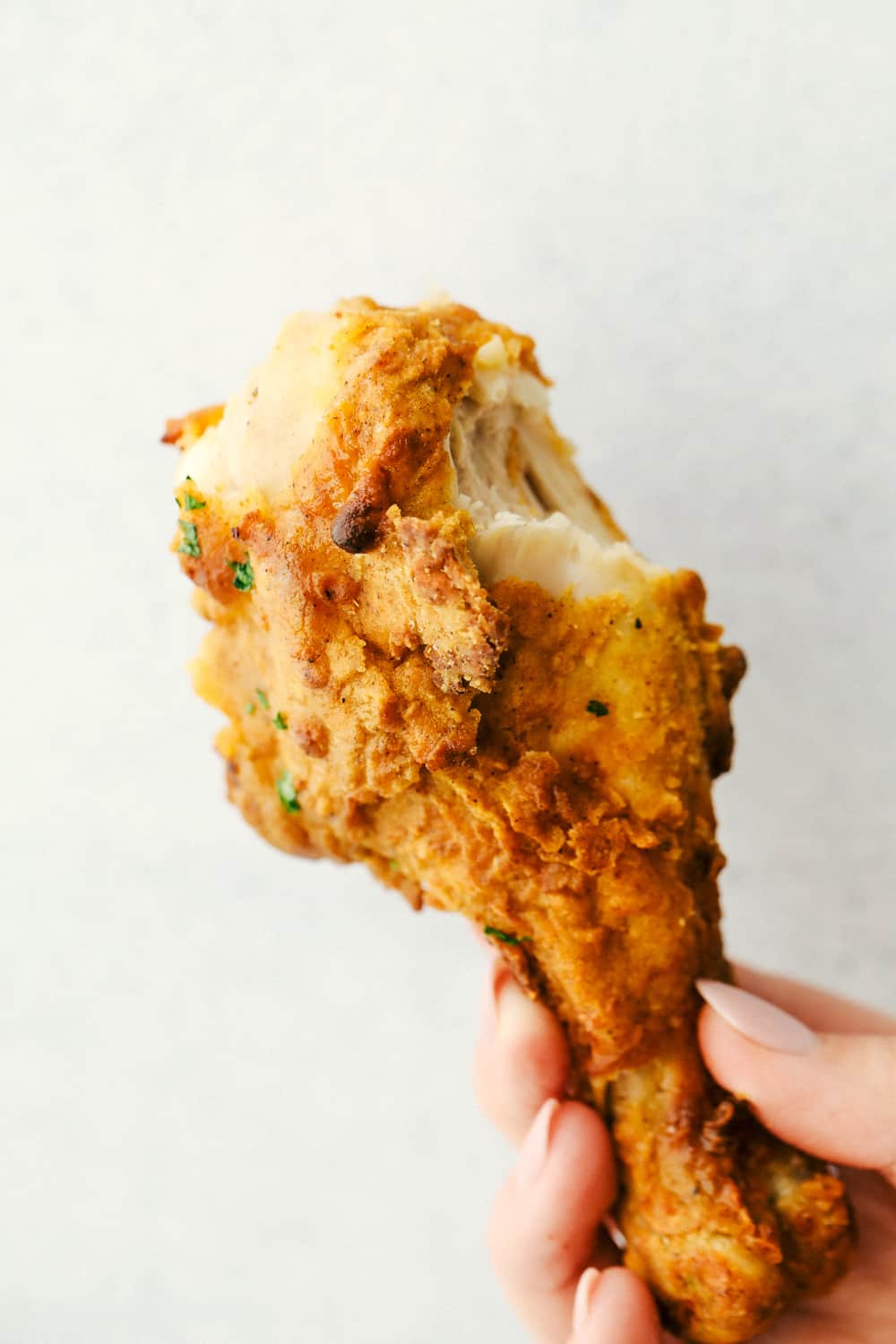 Crispy air fryer fried chicken leg.