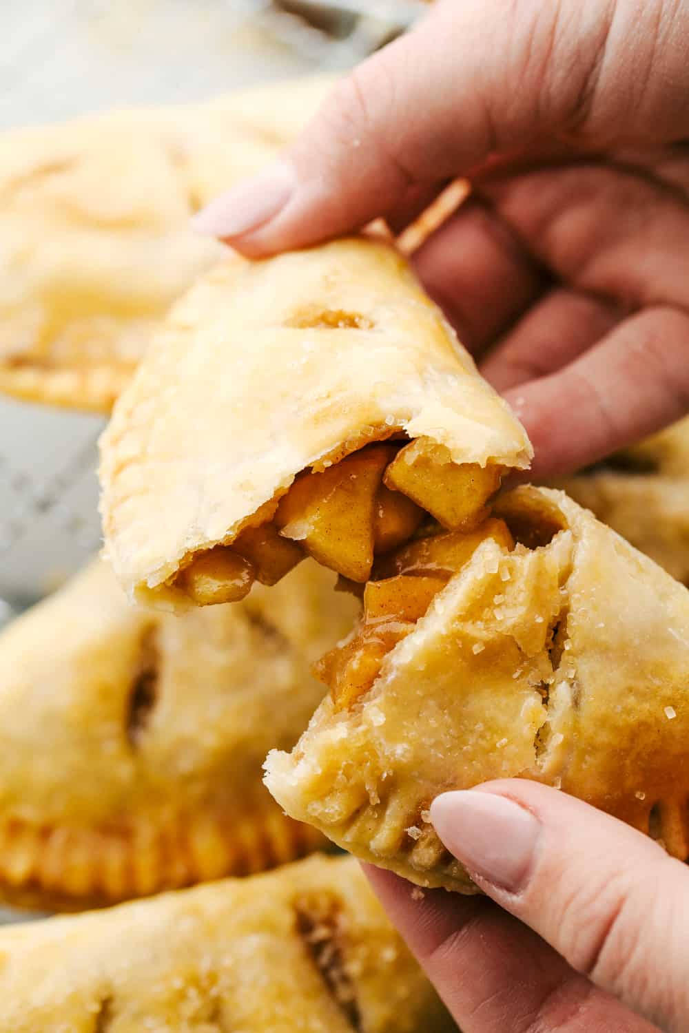 Breaking a hand held pie exposing the amazing filling. 