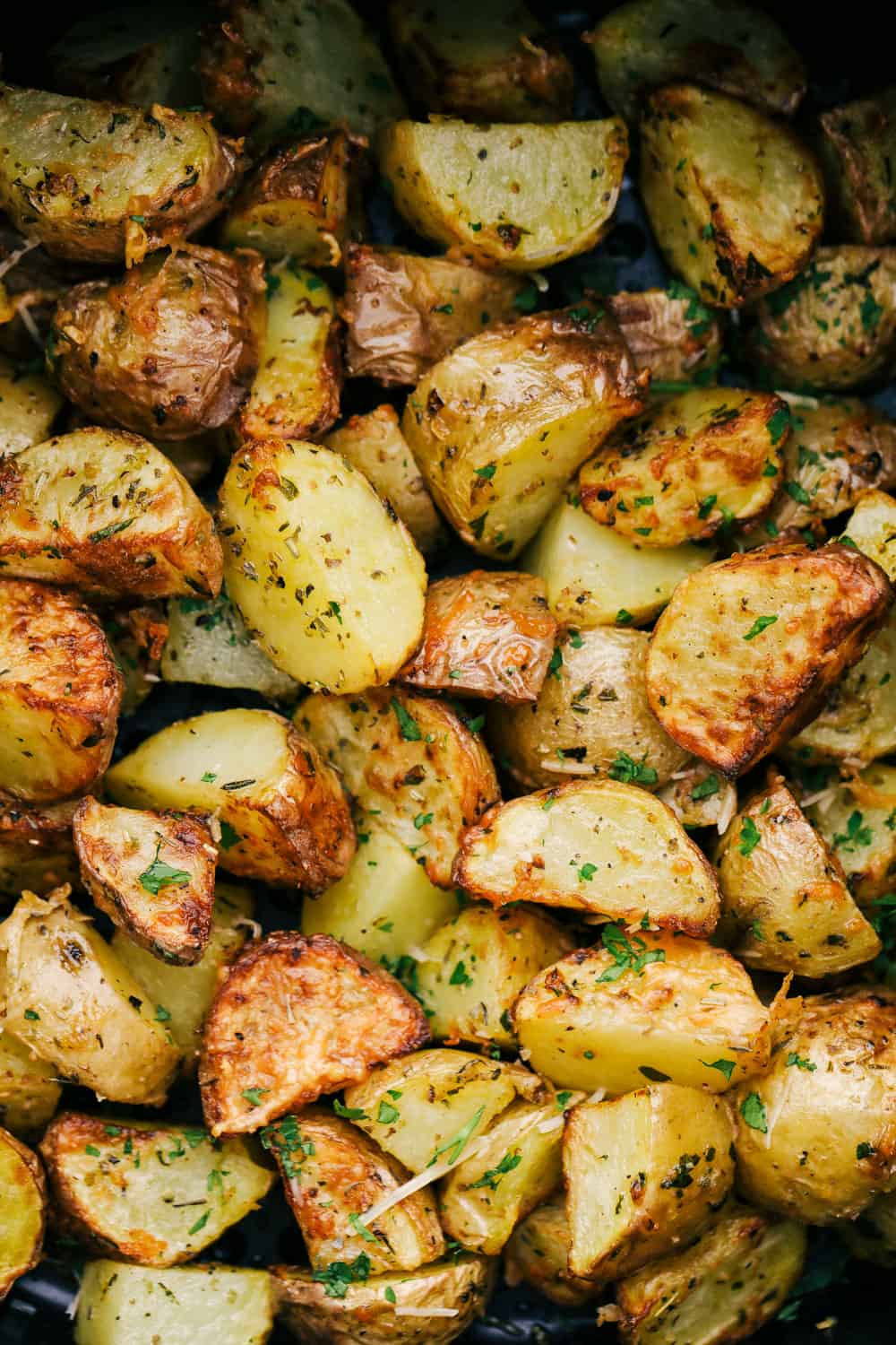 Perfectly roasted seasoned air fryer potatoes.