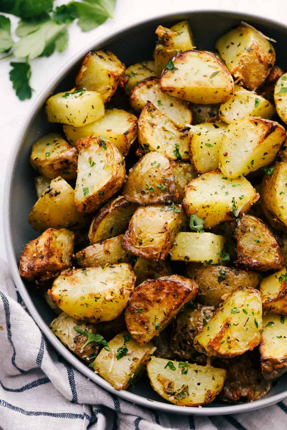 Herb crusted and perfectly seasoned air fryer roasted potatoes. 