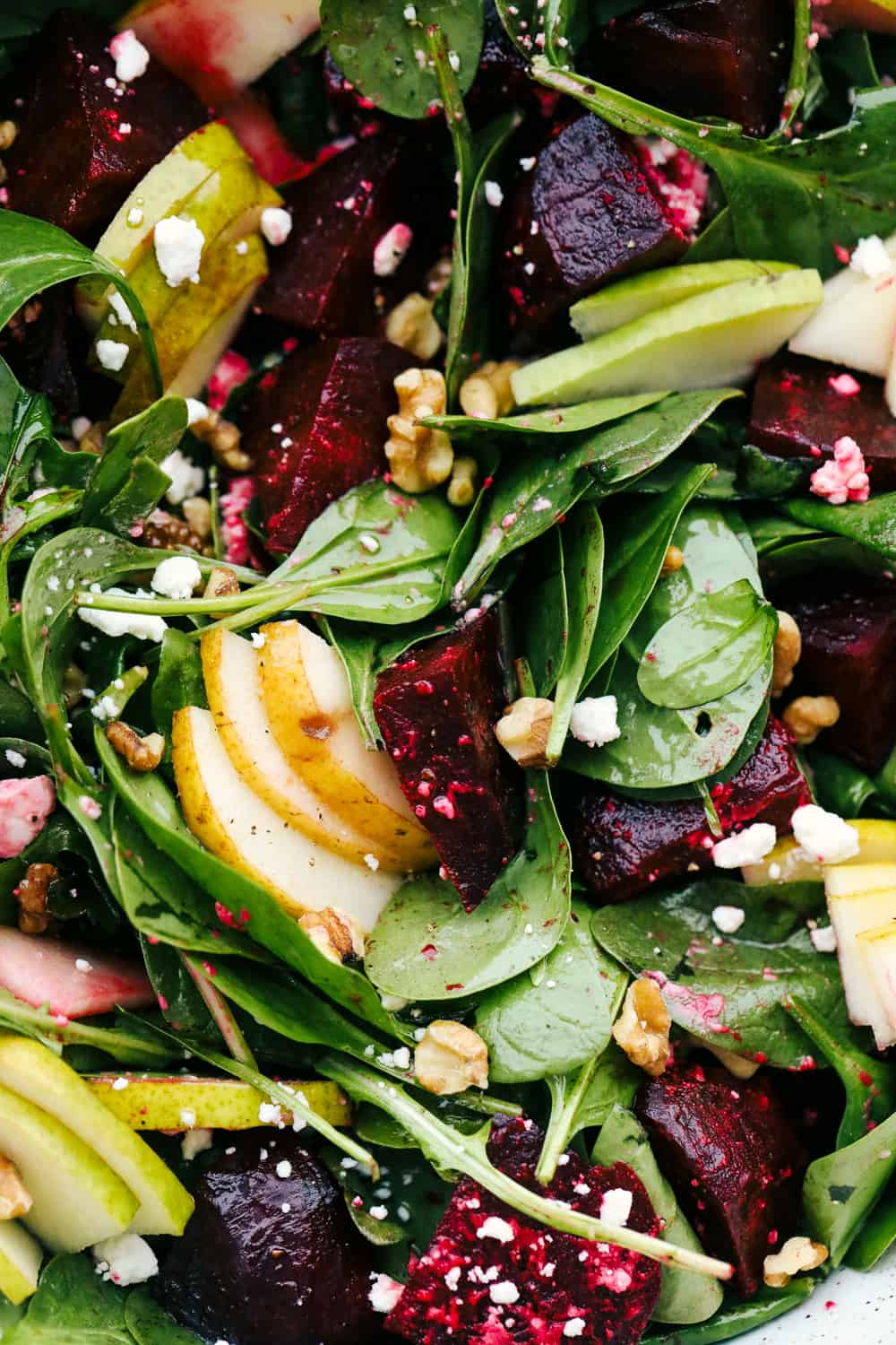 Pears, beets, feta, spinach and walnuts tossed together in a vinaigrette. 