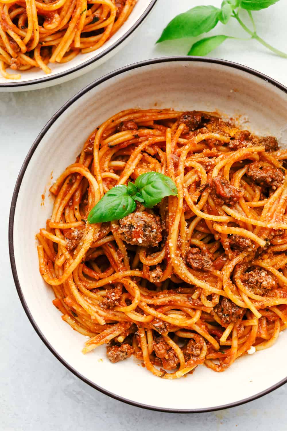 Spaghetti in a white bowl. 