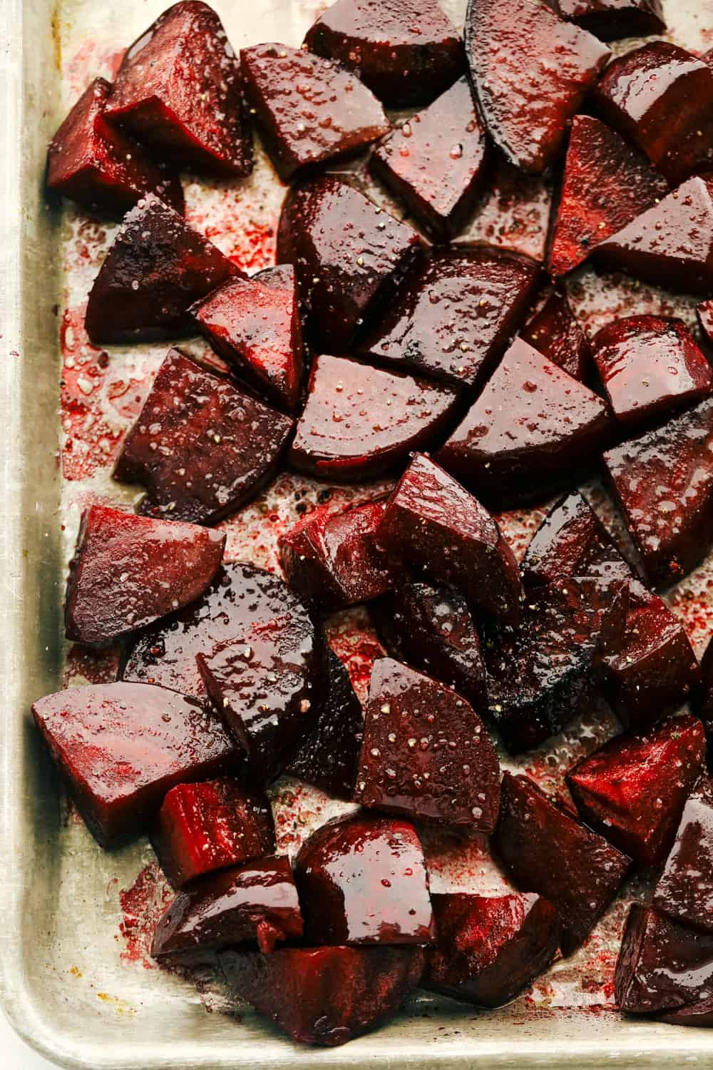 Roasted beets on a cookie sheet.