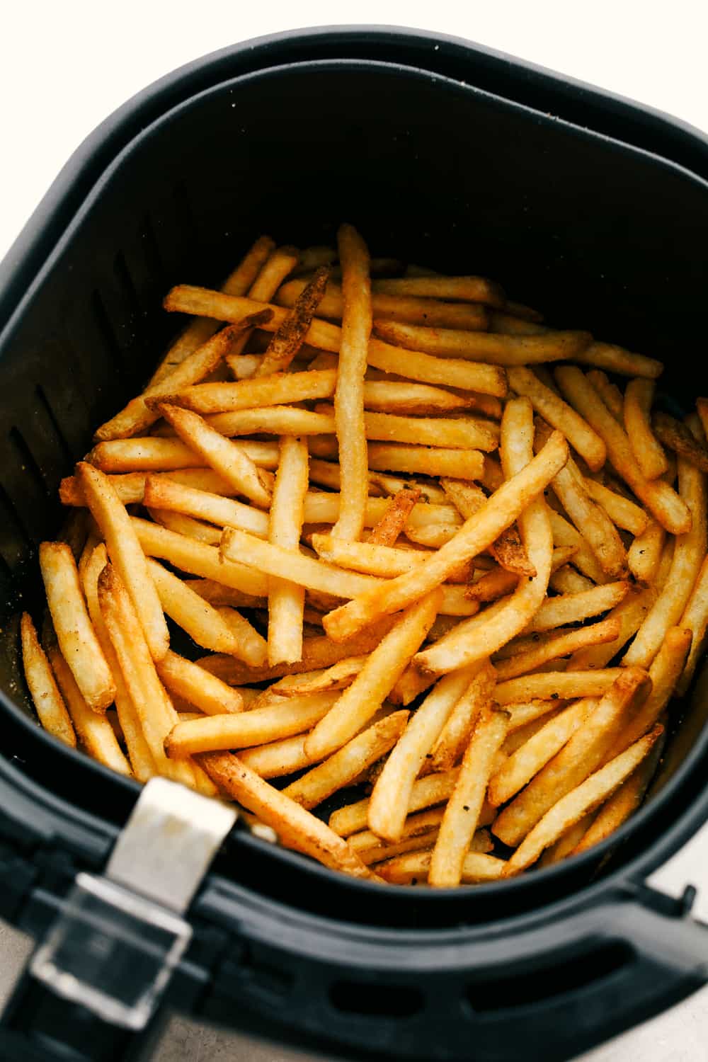 Frozen French Fries cooked in the air fryer. 