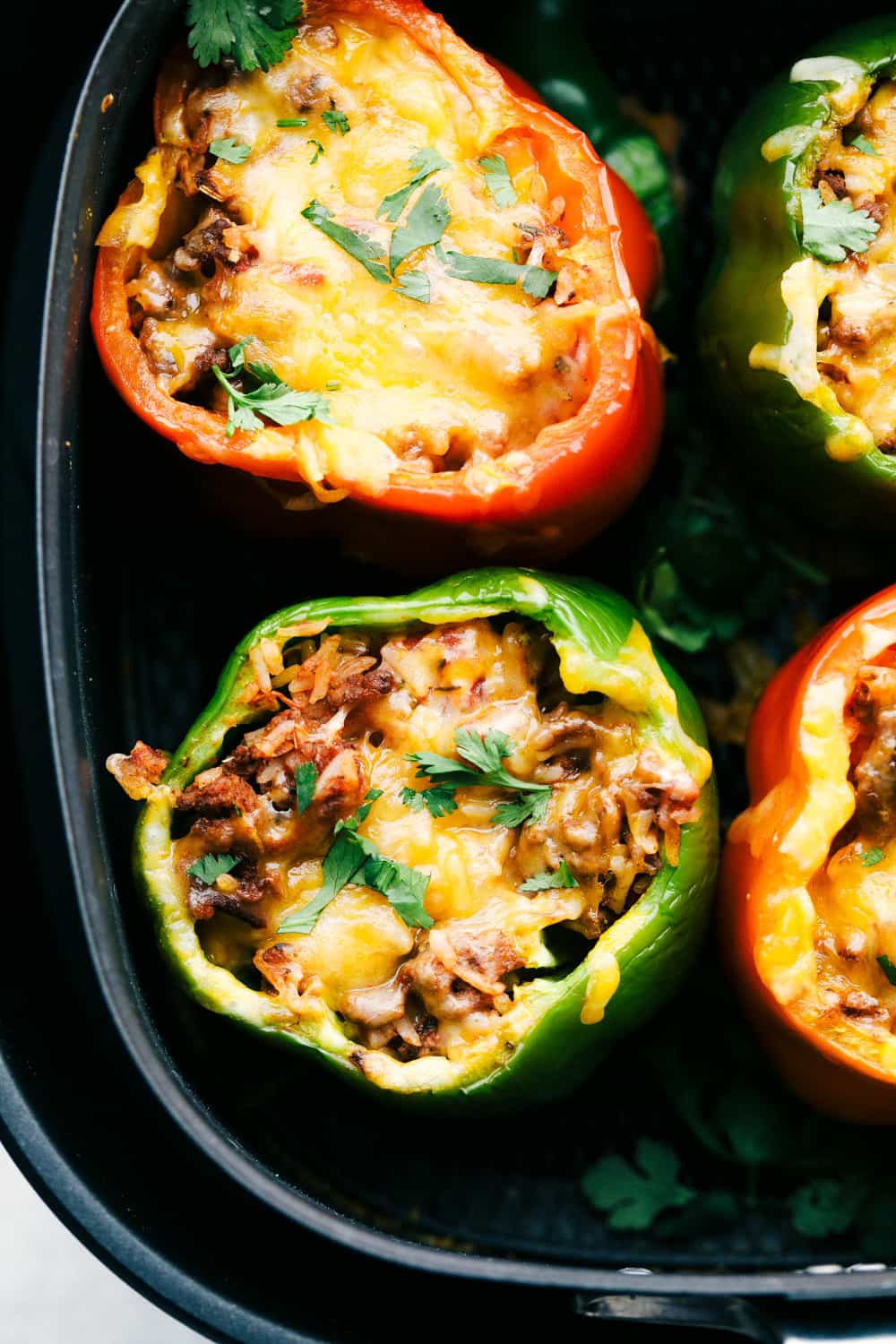 Air Fryer Stuffed peppers with cheesy rice filling. 