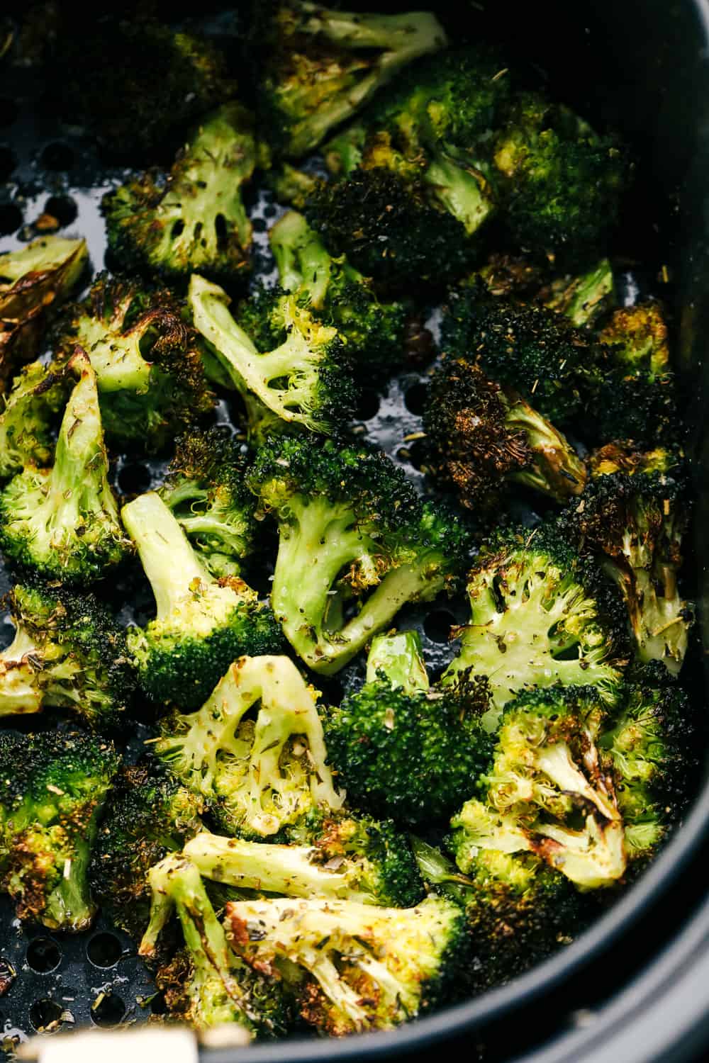 Air fryer "roasted" broccoli in the basket. 