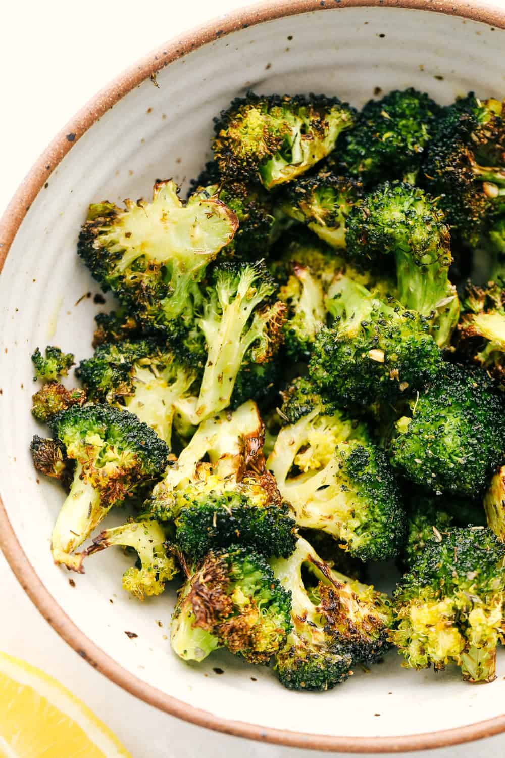 Air fryer roasted broccoli in a bowl. 