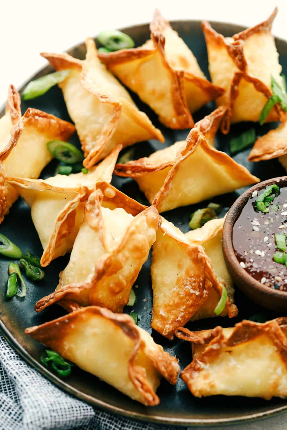 Air fryer wontons on a plate close up. 