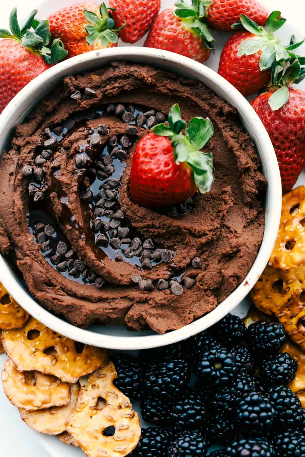 Chocolate Hummus with strawberries, pretzels and blackberries. 