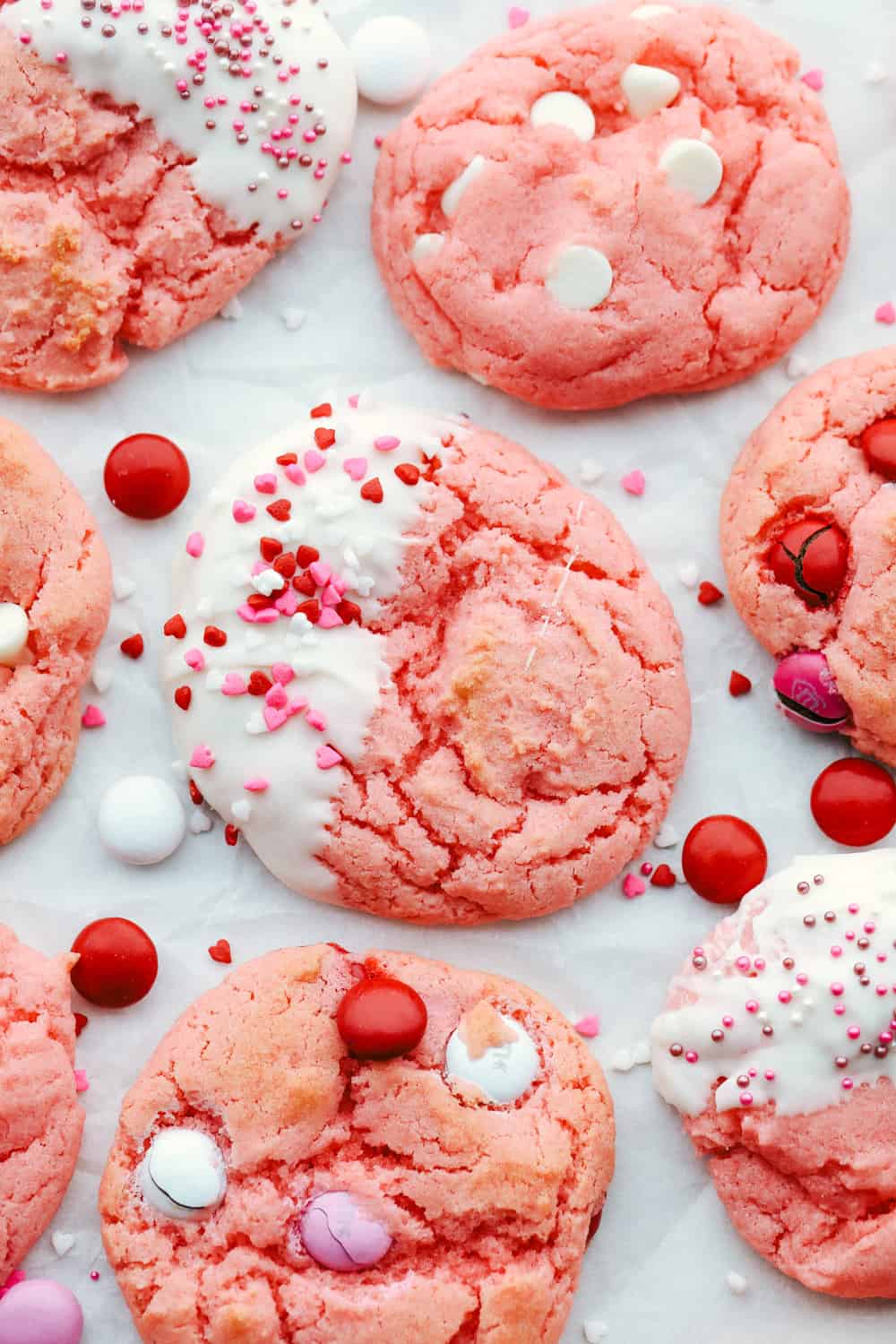 Strawberry cookies with M&M's, white chocolate chips and sprinkles. 