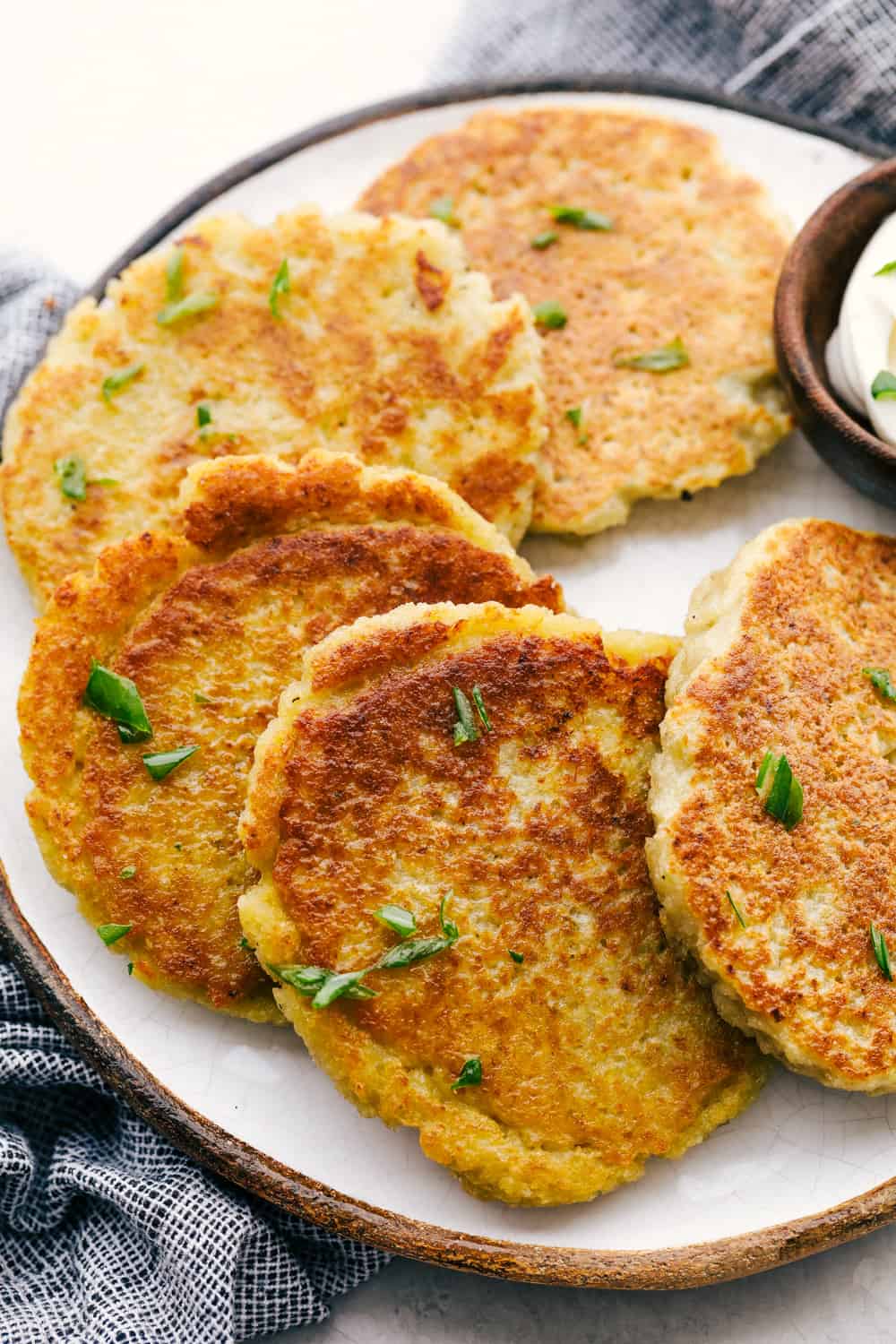 Crispy savory potato pancakes on a plate. 