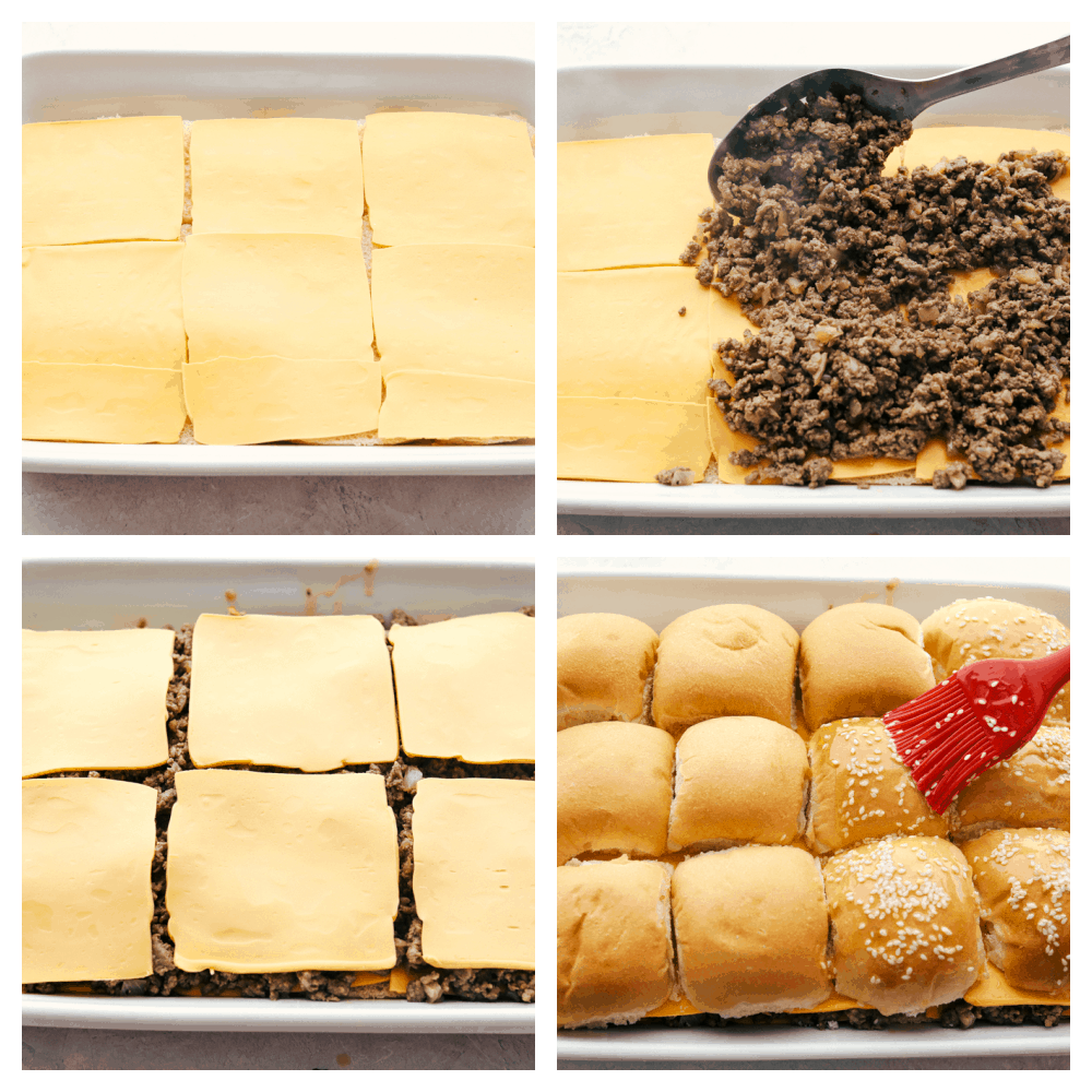 A sheet pan with sliced rolls and cheese on top, placing the hamburger and more cheese, then brushing the tops with sesame seeds.