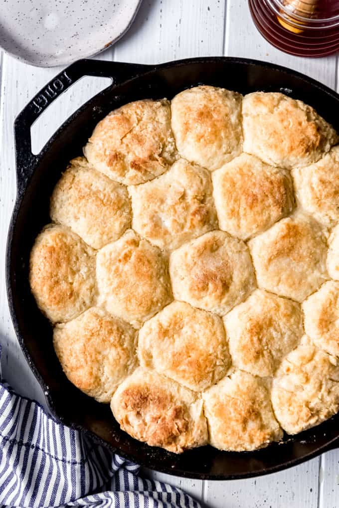 golden brown homemade biscuits in a pan