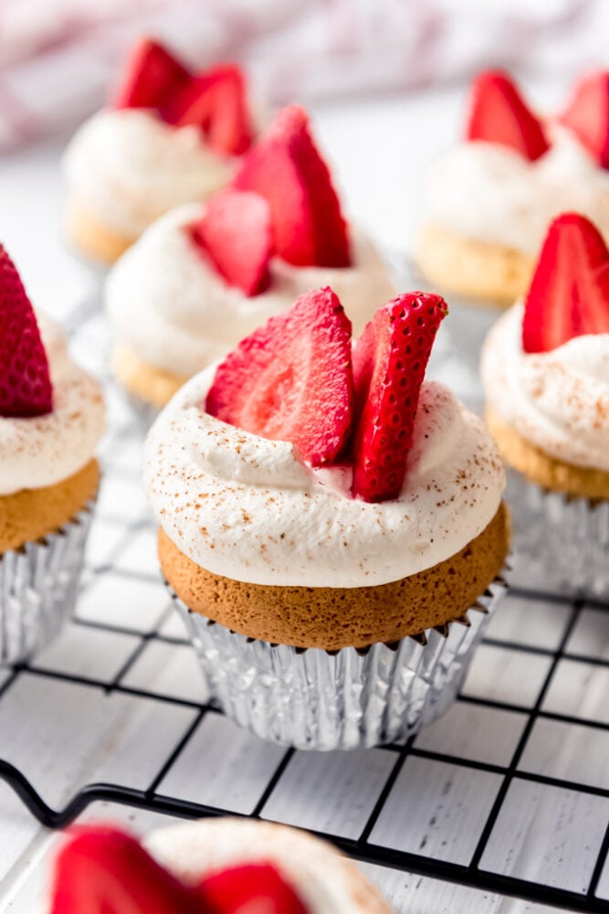 tres leches cupcakes on a wire rack