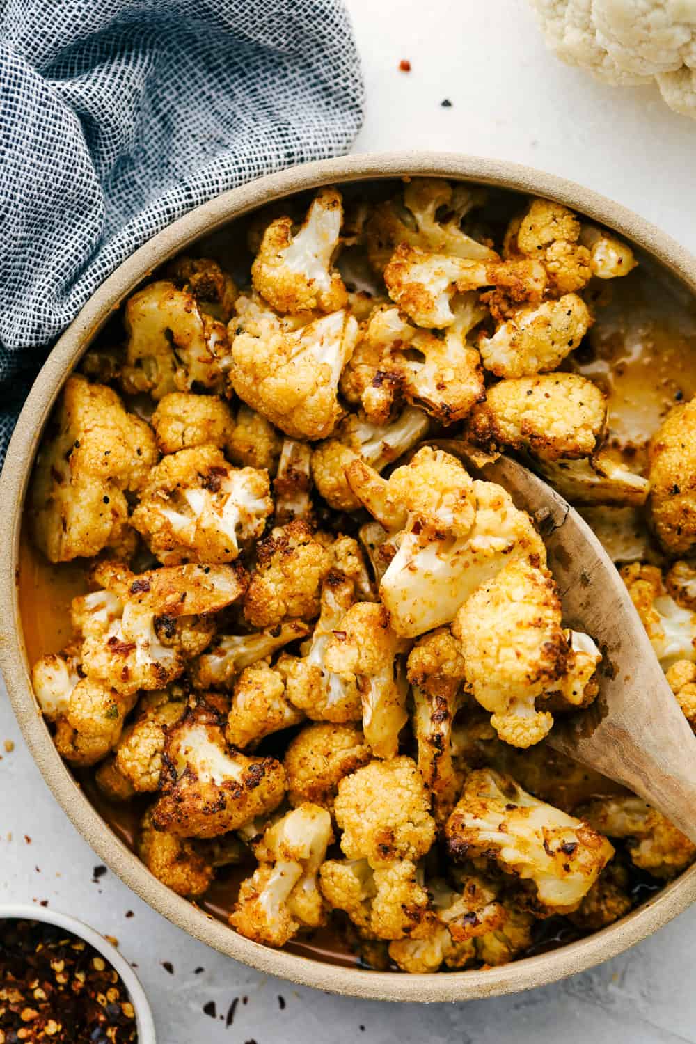 Perfectly roasted air fryer cauliflower in a bowl. 