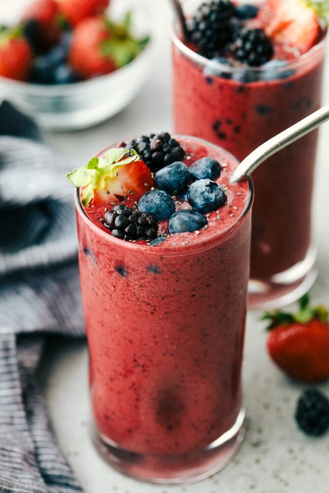 Mixed Berry Smoothie topped with berries and chia seeds. 