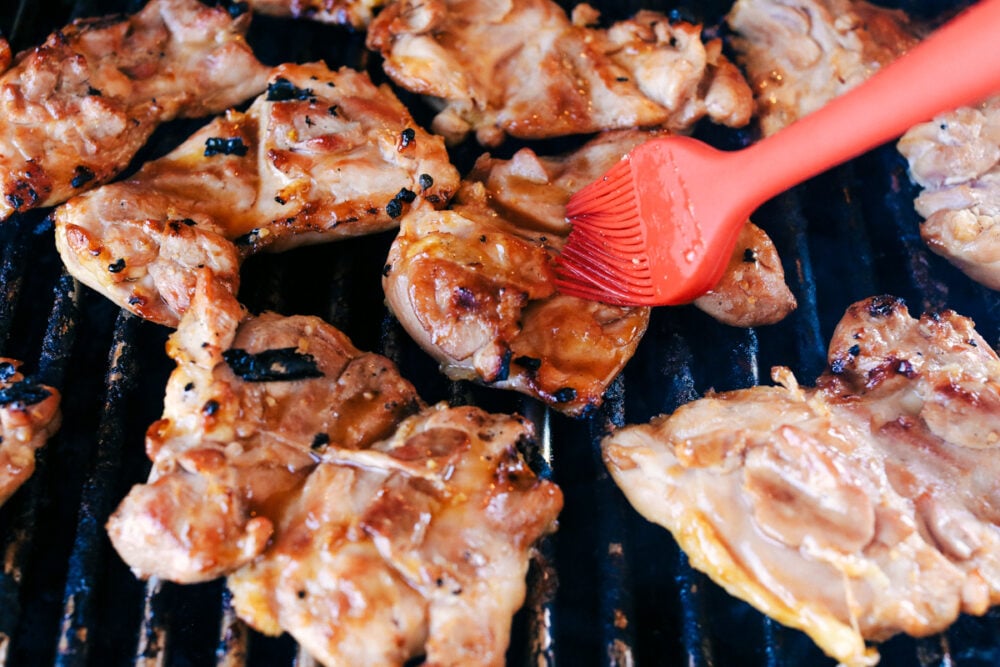 Grease the chicken while grilling. 