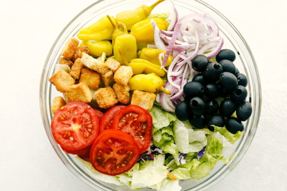 Ingredients ready to be mixed for the Olive Garden Salad. 