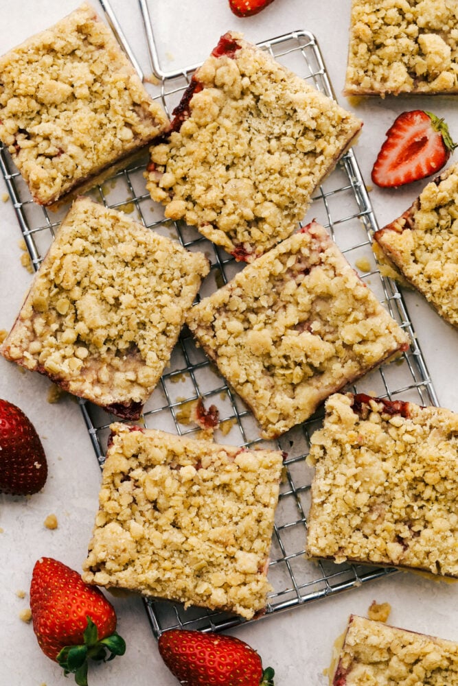 Strawberry streusel bars cut into squares for easy grabbing. 