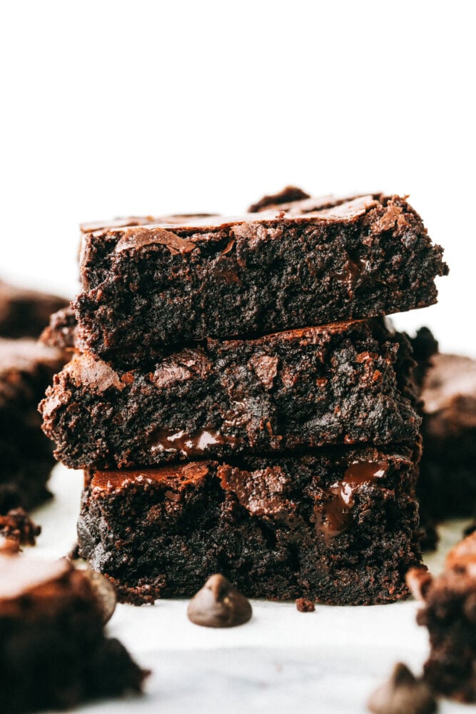 Brownie squares are stacked on top of each other. 