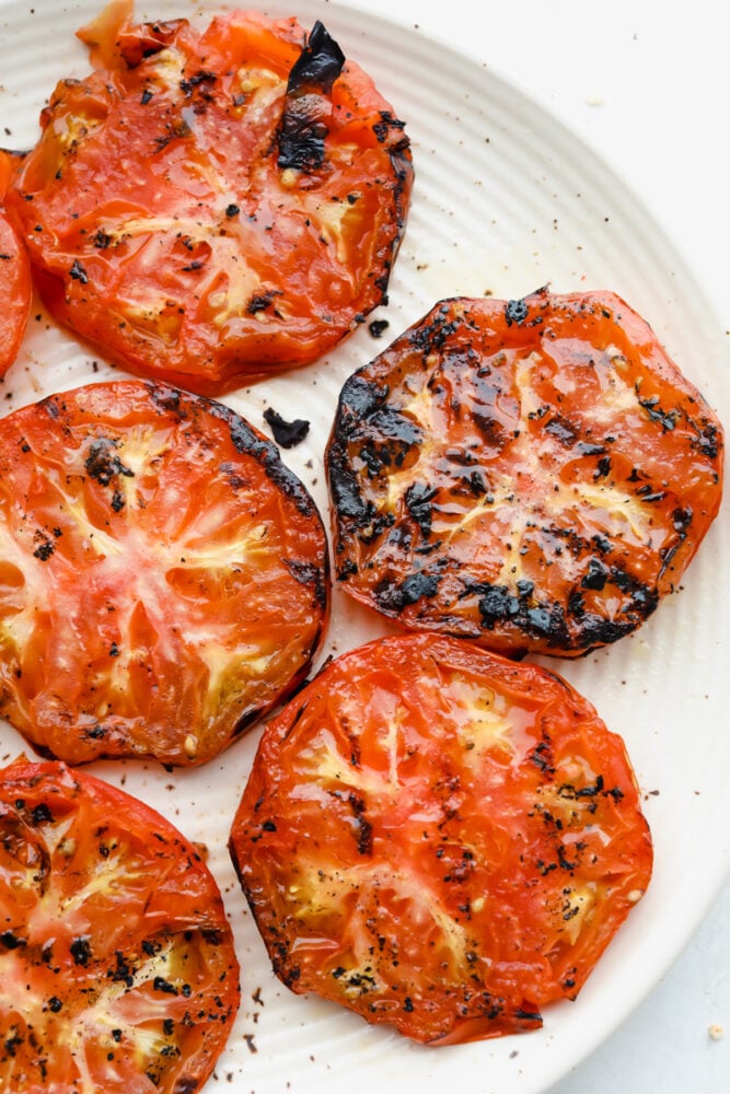 Grilled tomatoes on plate